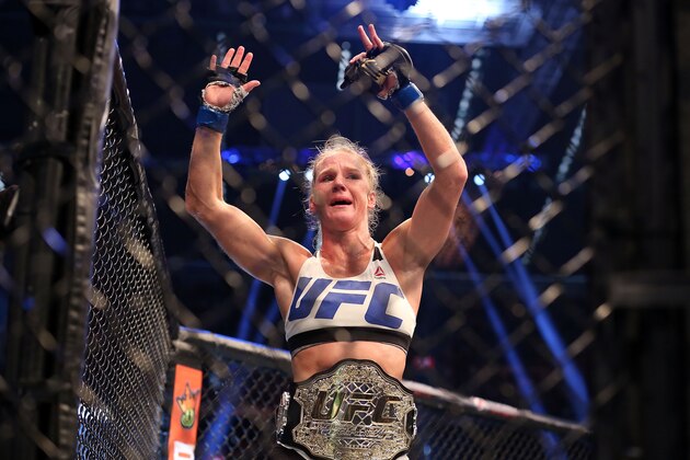 MELBOURNE, AUSTRALIA - NOVEMBER 15:  Holly Holm of the United States celebrates victory over Ronda Rousey of the United States in their UFC women's bantamweight championship bout during the UFC 193 event at Etihad Stadium on November 15, 2015 in Melbourne, Australia.  (Photo by Quinn Rooney/Getty Images)
