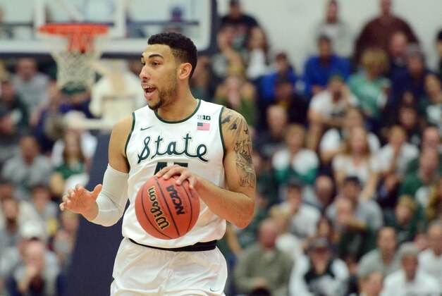 Nov 27, 2015; Fullerton , CA, USA; Michigan State Spartans guard Denzel Valentine (45) brings the ball up court against the Boise State Broncos during the first half at Titan Gym. Mandatory Credit: Jake Roth-USA TODAY Sports