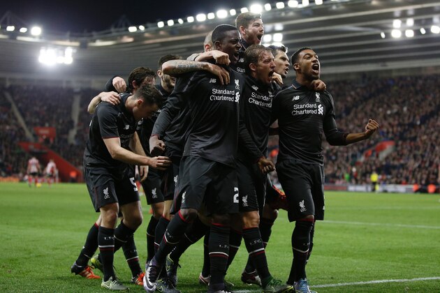 Liverpool's Belgian striker Daniel Origi (C) celebrates scoring his team's fourth goal with Liverpool's English midfielder Jordon Ibe (R) and teammates during the English League Cup quarter-final football match between Southampton and Liverpool at St Mary's Stadium in Southampton, southern England on December 2, 2015.   AFP PHOTO / ADRIAN DENNIS

RESTRICTED TO EDITORIAL USE. No use with unauthorized audio, video, data, fixture lists, club/league logos or 'live' services. Online in-match use limited to 75 images, no video emulation. No use in betting, games or single club/league/player publications. / AFP / ADRIAN DENNIS        (Photo credit should read ADRIAN DENNIS/AFP/Getty Images)