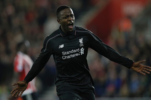 Liverpool's Belgian striker Daniel Origi celebrates scoring his team's fourth goal during the English League Cup quarter-final football match between Southampton and Liverpool at St Mary's Stadium in Southampton, southern England on December 2, 2015.   AFP PHOTO / ADRIAN DENNIS

RESTRICTED TO EDITORIAL USE. No use with unauthorized audio, video, data, fixture lists, club/league logos or 'live' services. Online in-match use limited to 75 images, no video emulation. No use in betting, games or single club/league/player publications. / AFP / ADRIAN DENNIS        (Photo credit should read ADRIAN DENNIS/AFP/Getty Images)