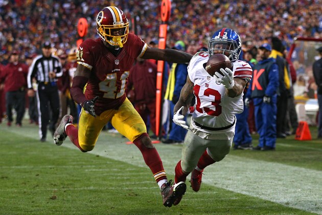 LANDOVER, MD - NOVEMBER 29: Wide receiver Odell Beckham #13 of the New York Giants scores a fourth quarter touchdown past cornerback Will Blackmon #41 of the Washington Redskins at FedExField on November 29, 2015 in Landover, Maryland. (Photo by Patrick Smith/Getty Images)