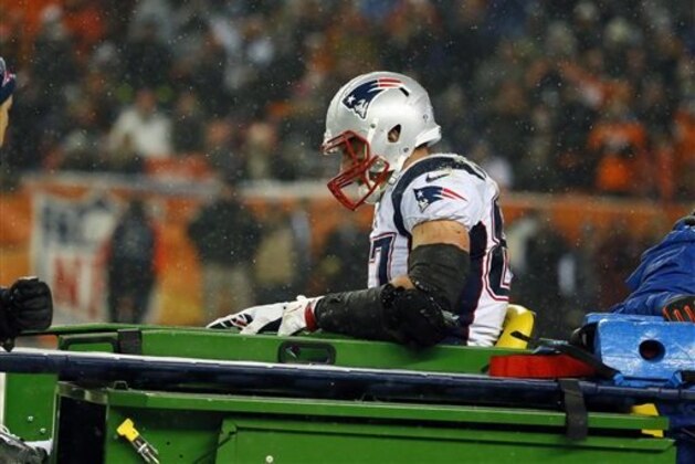 FILE - In this Nov. 29, 2015, file photo, New England Patriots tight end Rob Gronkowski is carted off the field after being injured against the Denver Broncos during the second half of an NFL football game in Denver. In case you missed it in Week 12 of the NFL season, there was Gronkowski, the NFL's best tight end and Tom Brady's only real receiving threat remaining, getting carted to the locker room. (AP Photo/Jack Dempsey, File)