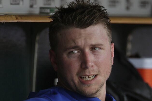 Toronto Blue Jays' Justin Smoak sits in the dugout after striking out against the Detroit Tigers during the fourth inning of a baseball game Sunday, July 5, 2015, in Detroit. (AP Photo/Duane Burleson)