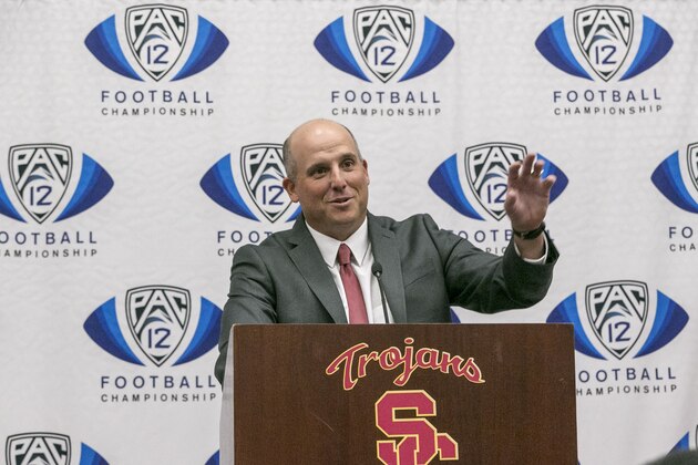 Southern California new coach Clay Helton takes questions from members of the media in Los Angeles, Monday, Nov. 30, 2015. USC hired Helton as its permanent coach on Monday, removing the interim tag five days before the Trojans face Stanford in the Pac-12 championship game. (AP Photo/Damian Dovarganes)