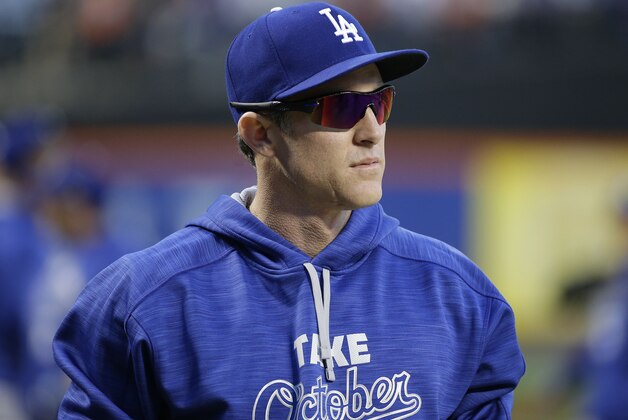 Los Angeles Dodgers' Chase Utley walks onto the field for batting practice before the start of baseball's Game 4 of the National League Division Series against the New York Mets, Tuesday, Oct. 13, 2015, in New York. (AP Photo/Frank Franklin II)