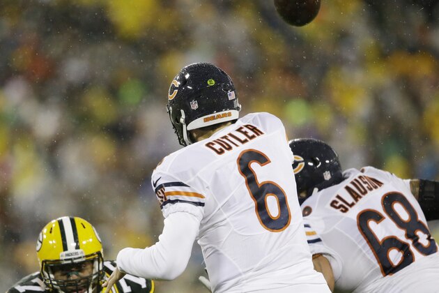 Chicago Bears quarterback Jay Cutler throws during the first half of an NFL football game against the Green Bay Packers Thursday, Nov. 26, 2015, in Green Bay, Wis. (AP Photo/Jeffrey Phelps)