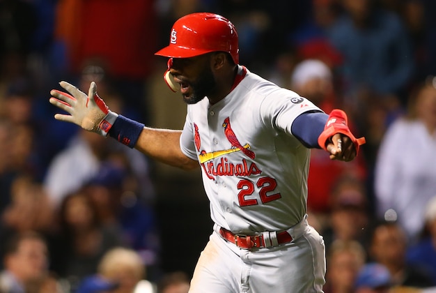 Jul 7, 2015; Chicago, IL, USA; St. Louis Cardinals right fielder Jason Heyward (22) celebrates after scoring during the sixth inning in game two of a baseball doubleheader against the Chicago Cubs at Wrigley Field. Mandatory Credit: Caylor Arnold-USA TODAY Sports