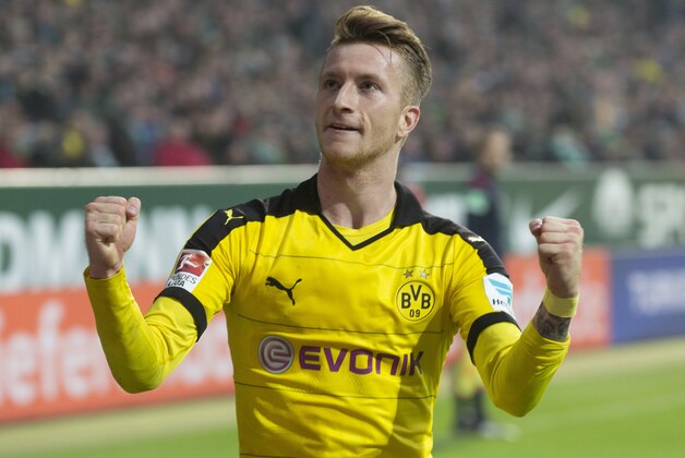 Dortmund's Marco Reus reacts after he scored the third goal for his team during the German Bundesliga soccer match between Werder Bremen and Borussia Dortmund in Bremen, Germany, Saturday, Oct. 31, 2015. (AP Photo/Joerg Sarbach)