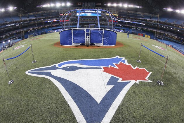 TORONTO, CANADA - APRIL 4: The Toronto Blue Jays logo painted on the field during batting practice before the Toronto Blue Jays home opener prior to the start of their MLB game against the New York Yankees on April 4, 2014 at Rogers Centre in Toronto, Ontario, Canada. (Photo by Tom Szczerbowski/Getty Images)