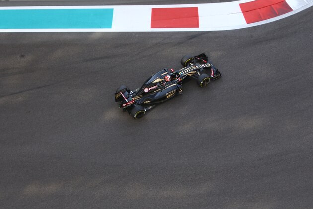 Lotus F1 Team's French driver  Romain Grosjean drives during the third practice session at the Yas Marina circuit in Abu Dhabi on November 28, 2015 ahead of the Abu Dhabi Formula One Grand Prix.    AFP PHOTO / MARWAN NAAMANI / AFP / MARWAN NAAMANI        (Photo credit should read MARWAN NAAMANI/AFP/Getty Images)
