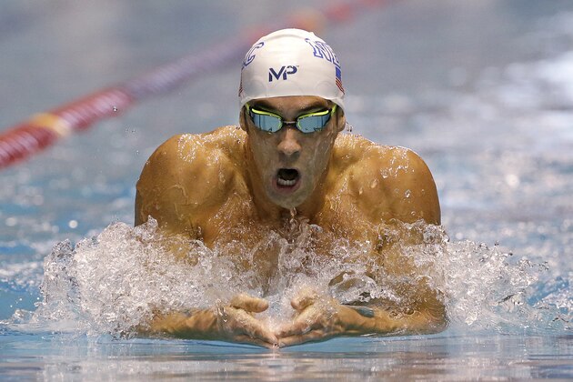 Michael Phelps swims the breaststroke leg of the men's 200 meter individual medley in a preliminary race at the U.S. Winter Nationals swimming event Thursday, Dec. 3, 2015, in Federal Way, Wash. (AP Photo/Elaine Thompson) Michael Phelps swims the breaststroke leg of the men's 200 meter individual medley in a preliminary race at the U.S. Winter Nationals swimming event Thursday, Dec. 3, 2015, in Federal Way, Wash. (AP Photo/Elaine Thompson)