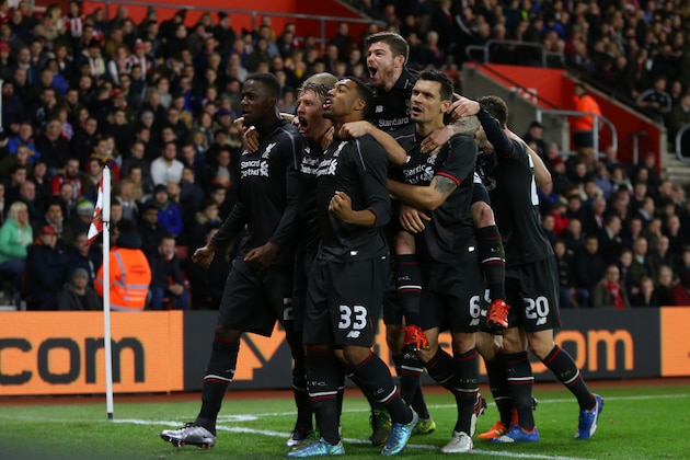 SOUTHAMPTON, ENGLAND - DECEMBER 02:  Divock Origi of Liverpool celebrates with his team mates after he scores to make it 1-4 during the Capital One Cup Quarter Final between Southampton and Liverpool at St Mary's Stadium on December 2, 2015 in Southampton, England.  (Photo by Catherine Ivill - AMA/Getty Images)