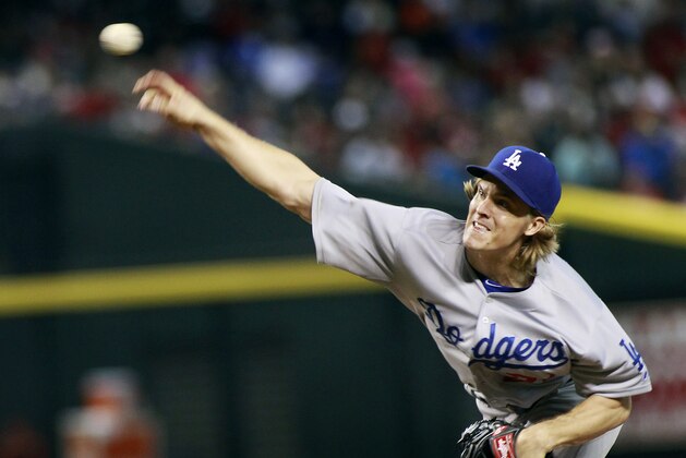 Los Angeles Dodgers starting pitcher Zach Greinke throws against the Arizona Diamondbacks during the seventh inning of a baseball game, Sunday, Sept. 13, 2015, in Phoenix. The Dodgers defeated the Diamondbacks 4-3. (AP Photo/Ralph Freso)