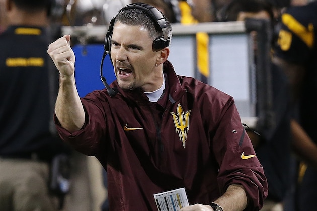 Arizona State offensive coordinator Mike Norvell cheers on his offensive unit during the first half of an NCAA college football game against Arizona Saturday, Nov. 30, 2013, in Tempe, Ariz. (AP Photo/Ross D. Franklin)