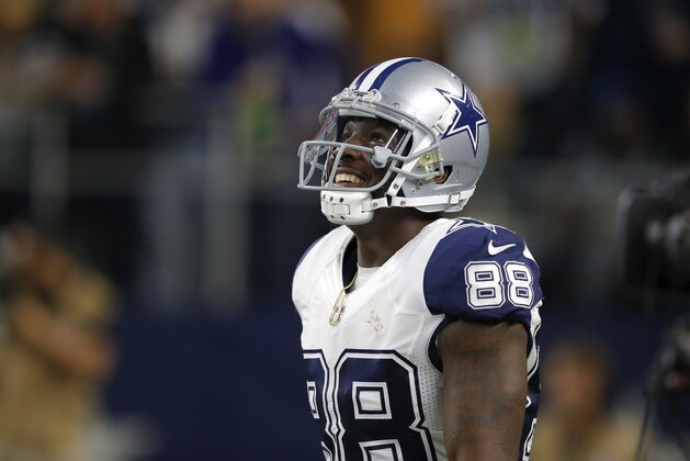 Dallas Cowboys wide receiver Dez Bryant (88) smiles after running a route against the Carolina Panthers during an NFL football game, Thursday, Nov. 26, 2015, in Arlington, Texas. (AP Photo/Brandon Wade)