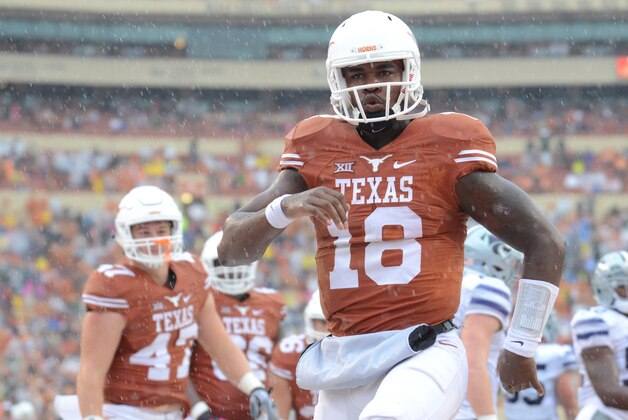 Oct 24, 2015; Austin, TX, USA; Texas Longhorns quarterback Tyrone Swoopes (18) reacts after a touchdown against the Kansas State Wildcats during the first half at Darrell K Royal-Texas Memorial Stadium. Mandatory Credit: Brendan Maloney-USA TODAY Sports