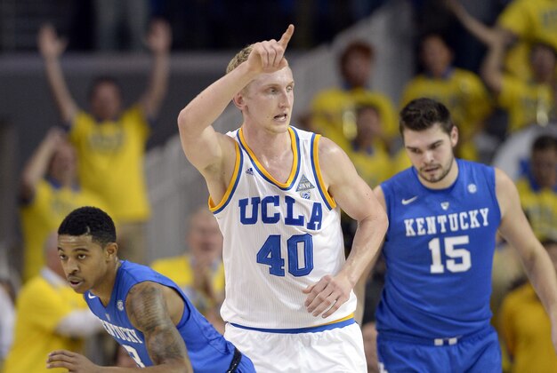Dec 3, 2015; Los Angeles, CA, USA; UCLA Bruins center Thomas Welsh (40) reacts a play against Kentucky Wildcats guard Tyler Ulis (3) and Kentucky Wildcats forward Isaac Humphries (15) during the first half at Pauley Pavilion. Mandatory Credit: Richard Mackson-USA TODAY Sports