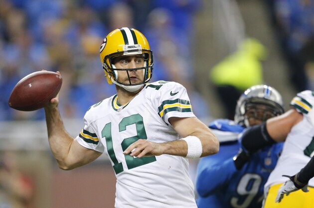 Green Bay Packers quarterback Aaron Rodgers (12) throws during the second half of an NFL football game against the Detroit Lions, Thursday, Dec. 3, 2015, in Detroit. (AP Photo/Rick Osentoski)
