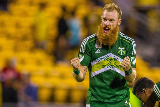 Sep 26, 2015; Columbus, OH, USA;Portland Timbers defender Nat Borchers (7) celebrates the win with the fans after the final whistle in the game against the Columbus Crew SC at MAPFRE Stadium. The Portland Timbers beat the Columbus Crew SC by the score of 2-1. Mandatory Credit: Trevor Ruszkowski-USA TODAY Sports