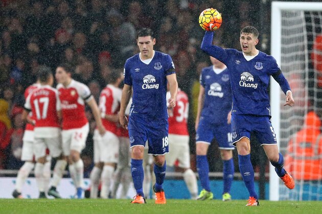 Everton's English defender John Stones (R) reacts after Everton concede their second goal during the English Premier League football match between Arsenal and Everton at the Emirates Stadium in London on October 24, 2015. AFP PHOTO / JUSTIN TALLIS

RESTRICTED TO EDITORIAL USE. No use with unauthorized audio, video, data, fixture lists, club/league logos or 'live' services. Online in-match use limited to 75 images, no video emulation. No use in betting, games or single club/league/player publications.        (Photo credit should read JUSTIN TALLIS/AFP/Getty Images)