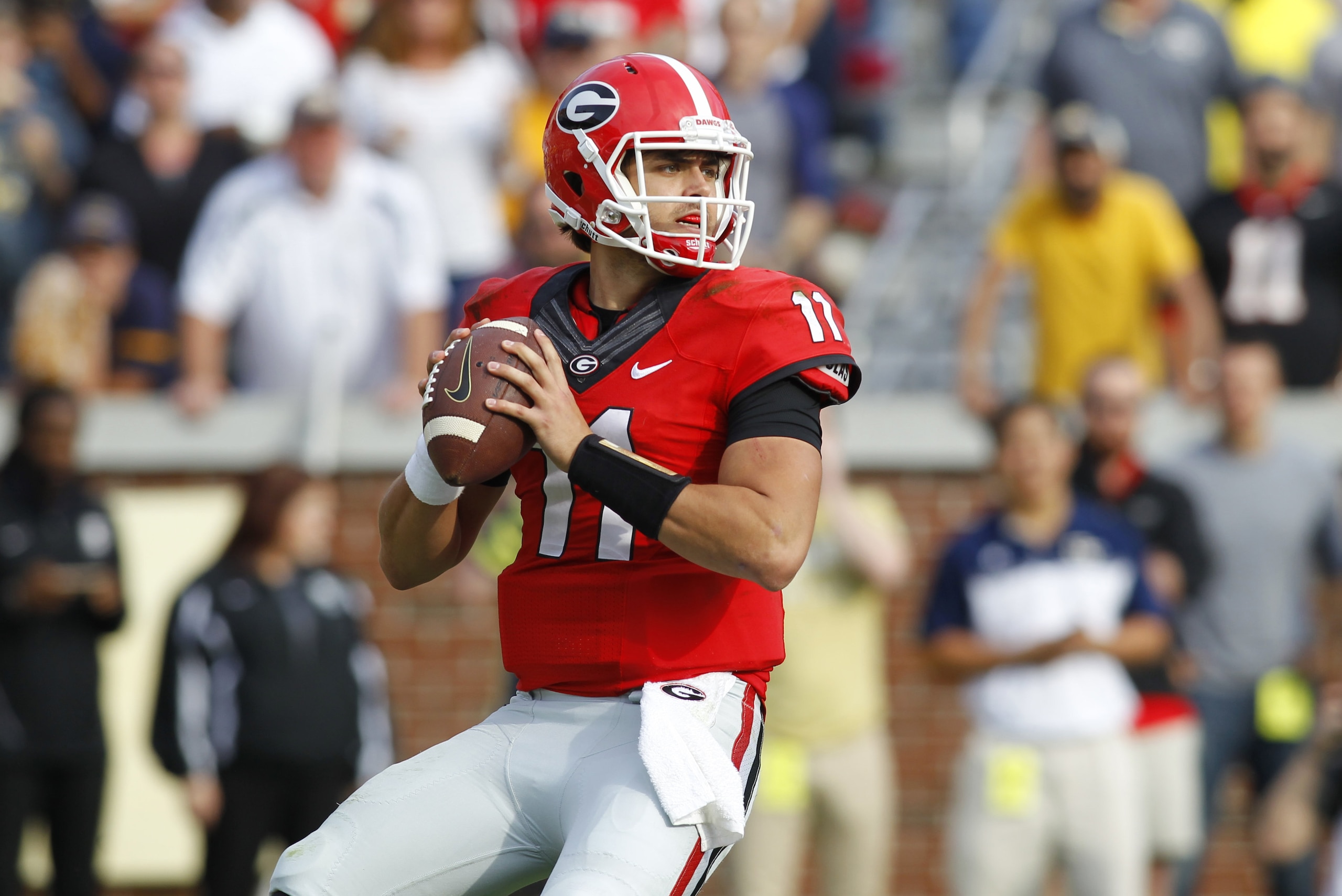 Georgia quarterback Greyson Lambert sets up to pass in the second half of an NCAA college football game against Georgia Tech on Saturday, Nov. 28, 2015, in Atlanta. (AP Photo/Brett Davis)