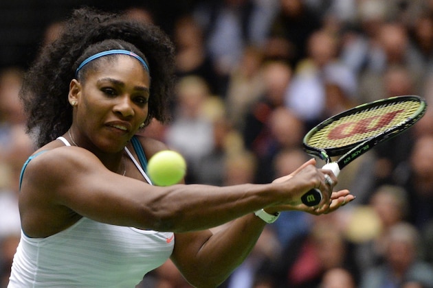 Serena Williams from the US returns a ball to Danish tennis player Caroline Wozniacki during their Champions Battle exhibition game in benefit of the development of Danish sports on November 26, 2015 in Herning, Denmark. Wozniacki won the match 6-3 6-4. AFP PHOTO / SCANPIX DENMARK / CLAUS FISKER +++ DENMARK OUT +++ / AFP / SCANPIX DENMARK / CLAUS FISKER        (Photo credit should read CLAUS FISKER/AFP/Getty Images)