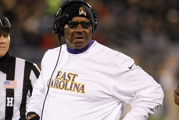 East Carolina head coach Ruffin McNeill questions a call during the second quarter of an NCAA college football game against Connecticut, Friday, Oct. 30, 2015, in East Hartford, Conn. (AP Photo/Stew Milne)