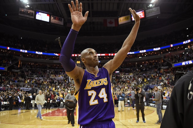 Los Angeles Lakers forward Kobe Bryant (24) waves to the crowd after an NBA basketball game against the Washington Wizards, Wednesday, Dec. 2, 2015, in Washington. The Lakers won 108-104. (AP Photo/Nick Wass)