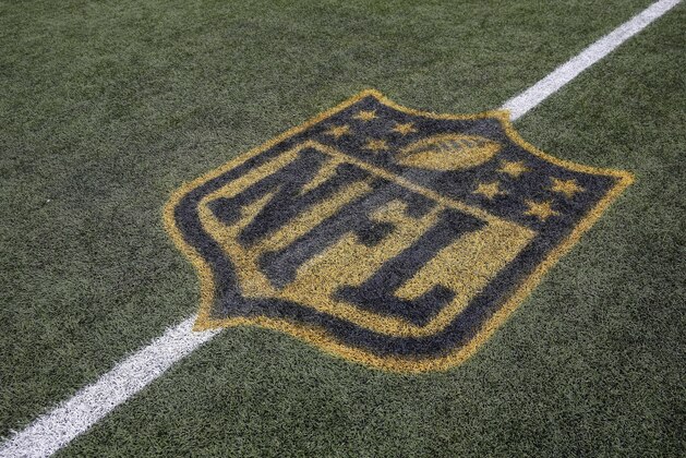 An NFL logo on the field at Gillette Stadium after an NCAA college football game between Massachusetts and Akron in Foxborough, Mass., Saturday, Nov. 7, 2015. Akron won 17-13. (AP Photo/Michael Dwyer)