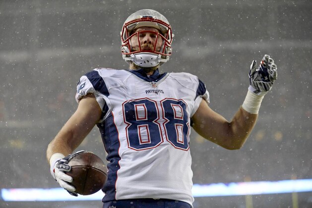 Nov 29, 2015; Denver, CO, USA; New England Patriots tight end Scott Chandler (88) reacts following a touchdown reception in the second quarter against the Denver Broncos at Sports Authority Field at Mile High. Mandatory Credit: Ron Chenoy-USA TODAY Sports