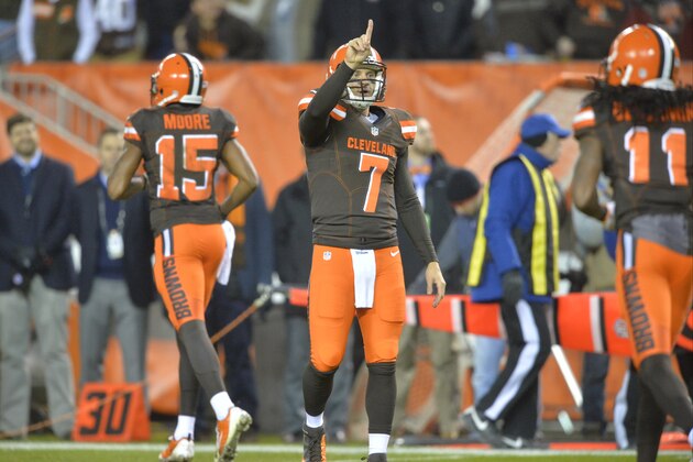 Cleveland Browns quarterback Austin Davis signals for an extra point attempt in the fourth quarter against the Baltimore Ravens during an NFL football game Monday, Nov. 30, 2015, in Cleveland. (AP Photo/David Richard)