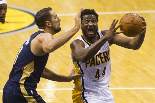 Indiana Pacers' Solomon Hill (44) drives the ball to the basket as he's defended by New Orleans Pelicans' Ryan Anderson (33) during the second half of a preseason NBA basketball game Saturday, Oct. 3, 2015, in Indianapolis. The Pelicans won 110-105. (AP Photo/Doug McSchooler)