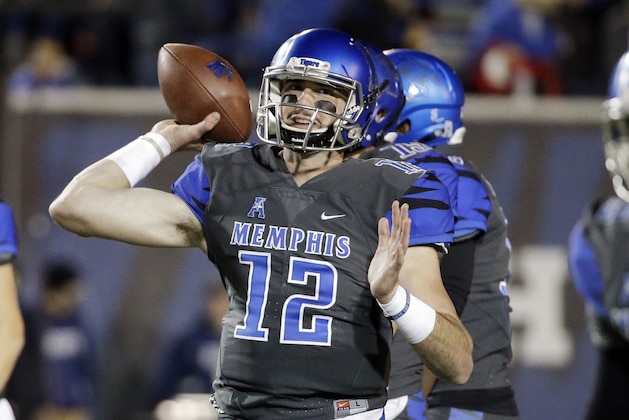 Memphis quarterback Paxton Lynch (12) warms up before the start of an NCAA college football game against Navy Saturday, Nov. 7, 2015, in Memphis, Tenn. (AP Photo/Mark Humphrey)