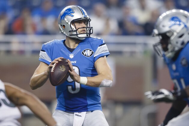 Detroit Lions quarterback Matthew Stafford (9) passes against the Philadelphia Eagles during an NFL football game at Ford Field in Detroit, Thursday, Nov. 26, 2015. (AP Photo/Rick Osentoski)