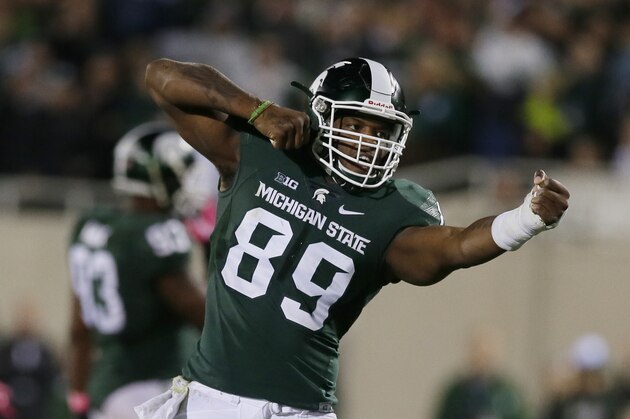 Michigan State defensive end Shilique Calhoun (89) reacts after a sack during the second half of an NCAA college football game against Indiana, Saturday, Oct. 24, 2015, in East Lansing, Mich. (AP Photo/Carlos Osorio)