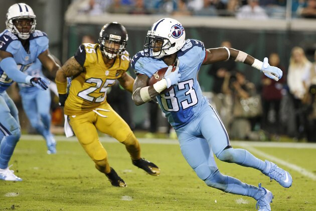 Tennessee Titans wide receiver Harry Douglas (83) runs past Jacksonville Jaguars defensive back Peyton Thompson (25) during the fourth quarter of an NFL football game Thursday, Nov. 19, 2015, in Jacksonville, Fla. (AP Photo/Brian Blanco)