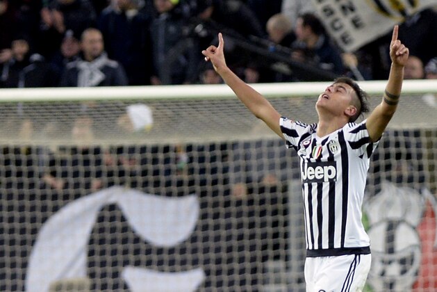 Juventus' Paulo Dybala celebrates after scoring during a Serie A soccer match between AC Milan and Juventus at the Turin Juventus Stadium Saturday, Nov. 21, 2015. (AP Photo/Massimo Pinca)