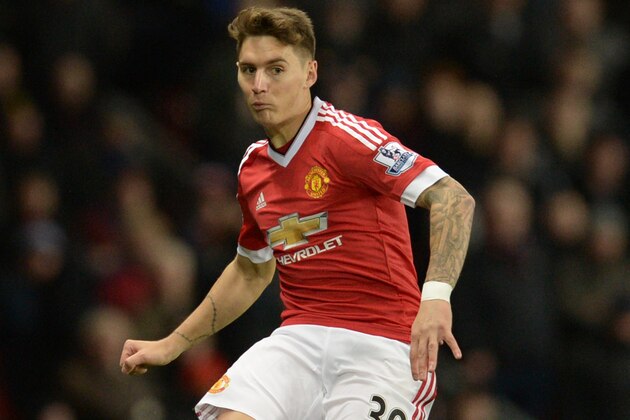 Manchester United's Uruguayan defender Guillermo Varela crosses the ball during the English Premier League football match between Manchester United and West Ham United at Old Trafford in Manchester, north west England, on December 5, 2015.  AFP PHOTO / OLI SCARFF

RESTRICTED TO EDITORIAL USE. No use with unauthorized audio, video, data, fixture lists, club/league logos or 'live' services. Online in-match use limited to 75 images, no video emulation. No use in betting, games or single club/league/player publications. / AFP / OLI SCARFF        (Photo credit should read OLI SCARFF/AFP/Getty Images)