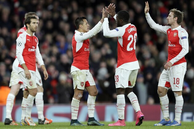 Arsenal's Alexis Sanchez, center left and Arsenal's Joel Campbell celebrate their team's victory at the end of the Champions League Group F soccer match between Arsenal and Dinamo Zagreb, at The Emirates Stadium in London, Britain, Tuesday, Nov. 24, 2015. (AP Photo/Tim Ireland) Arsenal's Alexis Sanchez, center left and Arsenal's Joel Campbell celebrate their team's victory at the end of the Champions League Group F soccer match between Arsenal and Dinamo Zagreb, at The Emirates Stadium in London, Britain, Tuesday, Nov. 24, 2015. (AP Photo/Tim Ireland)