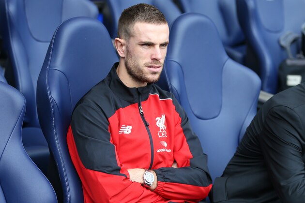 LONDON, ENGLAND - OCTOBER 17:  Jordan Henderson of Liverpool watches the warm up before the Barclays Premier League match between Tottenham Hotspur and Liverpool at White Hart Lane on October 17, 2015 in London, England.  (Photo by Catherine Ivill - AMA/Getty Images)