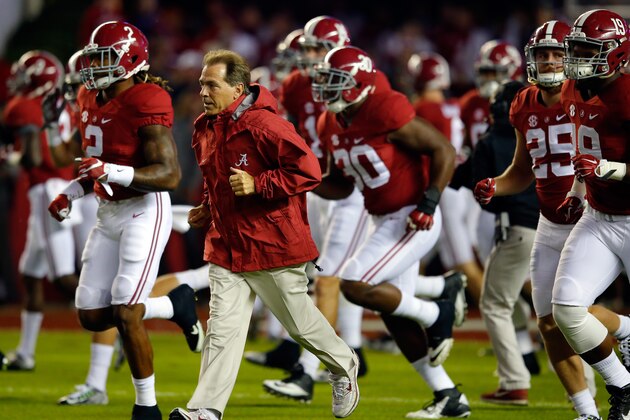 TUSCALOOSA, AL - NOVEMBER 07:  Nick Saban, head coach of the Alabama Crimson Tide, runs onto the field before playing against the LSU Tigers at Bryant-Denny Stadium on November 7, 2015 in Tuscaloosa, Alabama.  (Photo by Kevin C. Cox/Getty Images)