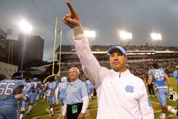 Oct 3, 2015; Atlanta, GA, USA; North Carolina Tar Heels head coach Larry Fedora celebrates their win over the Georgia Tech Yellow Jackets at Bobby Dodd Stadium. North Carolina won 38-31. Mandatory Credit: Jason Getz-USA TODAY Sports
