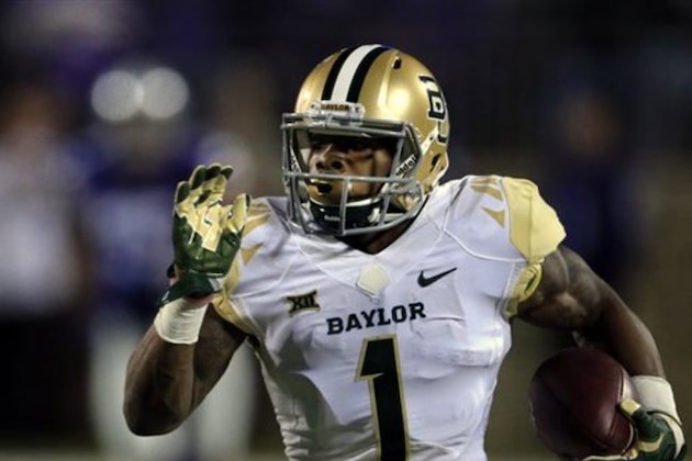 FILE - In this Nov. 5, 2015, file photo, Baylor wide receiver Corey Coleman runs for a touchdown during an NCAA college football game against Kansas State in Manhattan, Kan. Coleman is the FBS leader with 20 touchdown catches. Baylor plays Texas on Saturday. (AP Photo/Orlin Wagner, File)
