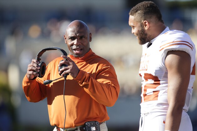 Texas head coach Charlie Strong during the first half/ second half of an NCAA college football game, Saturday, Nov. 14, 2015, in Morgantown, W.Va. (AP Photo/Raymond Thompson)