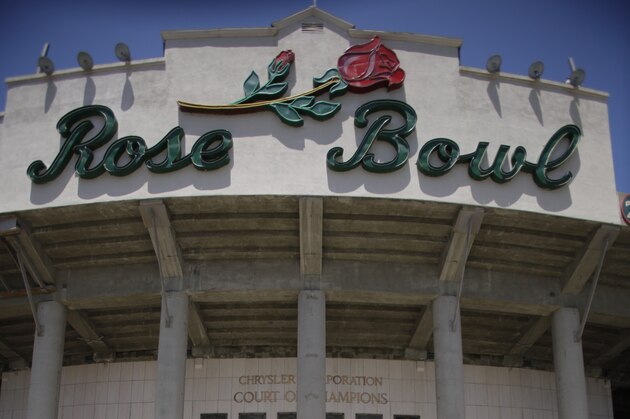 The new Pac-10 Conference logo is displayed outside the Rose Bowl in Pasadena, Calif, on Thursday, July 29, 2010.  (AP Photo/Damian Dovarganes)