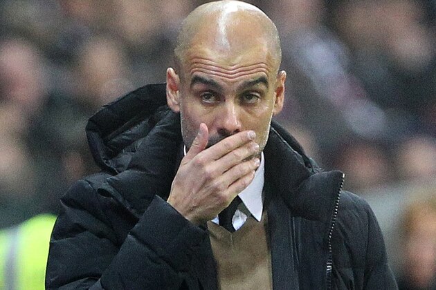 Bayern Munich's Spanish head coach Pep Guardiola reacts during the German first division Bundesliga football match Eintracht Frankfurt vs FC Bayern Munich in Frankfurt am Main, western Germany, on October 30, 2015. The match ended 0-0.   AFP PHOTO / DANIEL ROLAND

RESTRICTIONS: DURING MATCH TIME: DFL RULES TO LIMIT THE ONLINE USAGE TO 15 PICTURES PER MATCH AND FORBID THE IMAGE SEQUENCES TO SIMULATE VIDEO.
== RESTRICTED TO EDITORIAL USE == 
FOR FURTHER QUERIES PLEASE CONTACT DFL DIRECTLY AT + 49 69 650050.        (Photo credit should read DANIEL ROLAND/AFP/Getty Images)