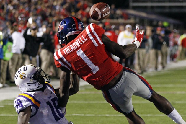Mississippi wide receiver Laquon Treadwell (1) has a pass knocked away by LSU cornerback Tre'Davious White (18) in the second half of an NCAA college football game in Oxford, Miss., Saturday, Nov. 21, 2015. Mississippi won 38-17. (AP Photo/Rogelio V. Solis)