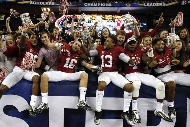 Dec 5, 2015; Atlanta, GA, USA; Alabama Crimson Tide wide receiver Richard Mullaney (16) celebrates with teammates and fans after defeating the Florida Gators in the 2015 SEC Championship Game at the Georgia Dome. Alabama won 29-15. Mandatory Credit: Jason Getz-USA TODAY Sports