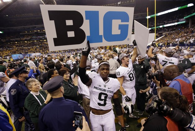 Michigan State's Montae Nicholson (9) celebrates after Michigan State defeated Iowa 16-13 to win the Big Ten championship NCAA college football game Saturday, Dec. 5, 2015, in Indianapolis. (AP Photo/AJ Mast)
