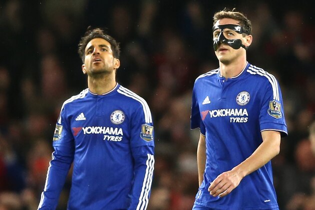 Chelsea's Spanish midfielder Cesc Fabregas and Chelsea's Serbian midfielder Nemanja Matic (R) react after Bournemouth scored during the English Premier League football match between Chelsea and Bournemouth at Stamford Bridge in London on December 5, 2015.   AFP PHOTO / JUSTIN TALLIS

RESTRICTED TO EDITORIAL USE. No use with unauthorized audio, video, data, fixture lists, club/league logos or 'live' services. Online in-match use limited to 75 images, no video emulation. No use in betting, games or single club/league/player publications. / AFP / JUSTIN TALLIS        (Photo credit should read JUSTIN TALLIS/AFP/Getty Images)